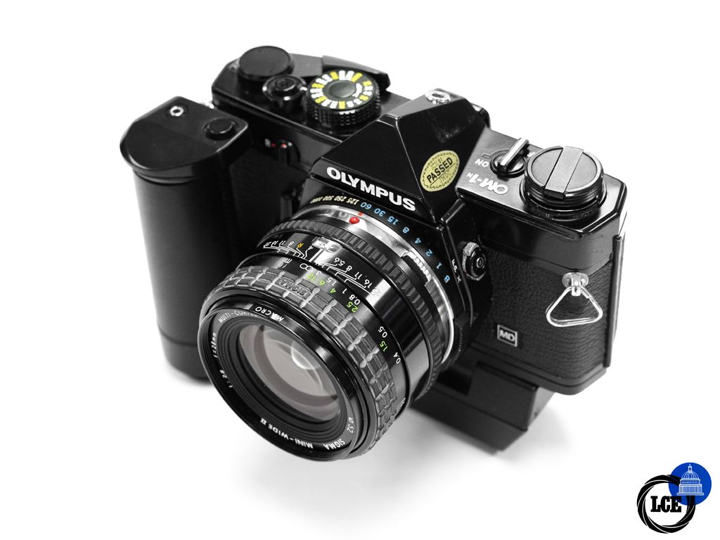 Olympus OM-1N Black + Motor Grip + Sigma 28mm F2.8 lens