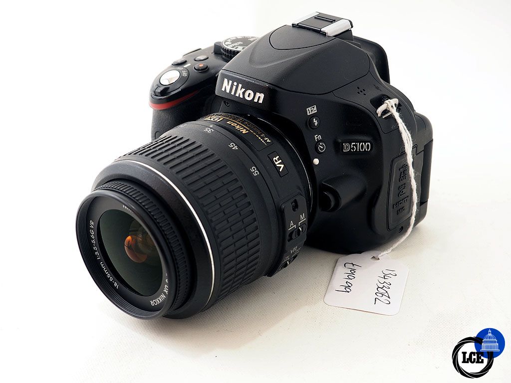 Nikon D5100 + 18-55mm 