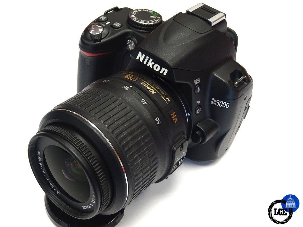Nikon D3000 + 18-55mm 