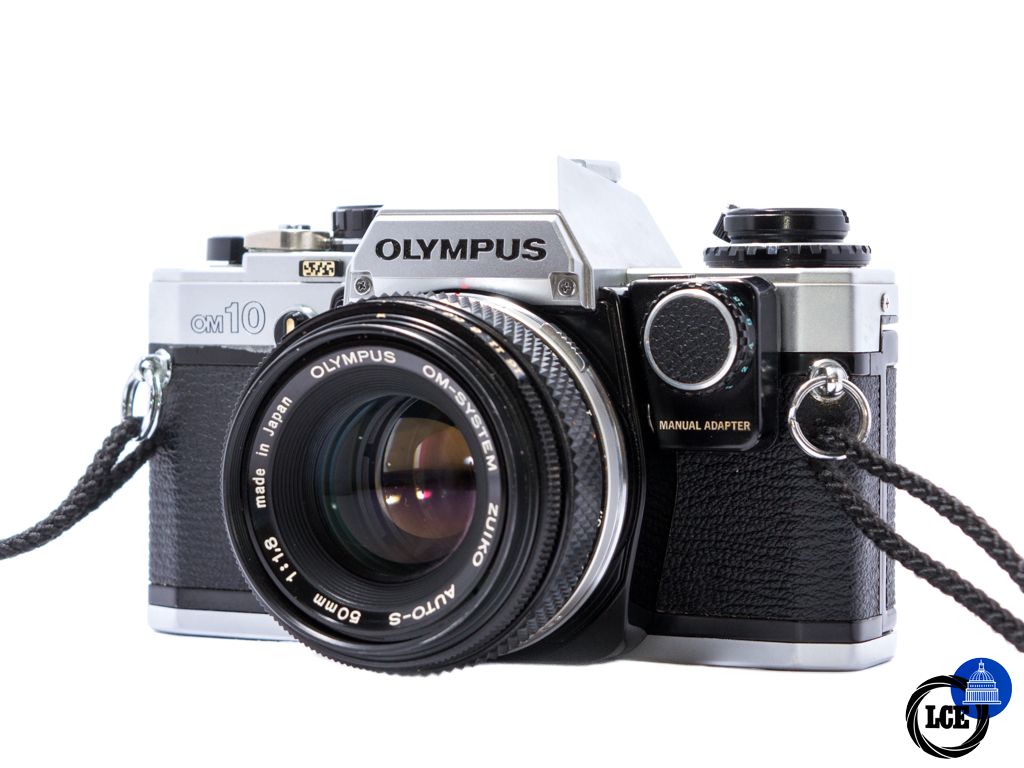 Olympus OM10 + 50mm f1.8 + Hunter strap + Manual Adapter
