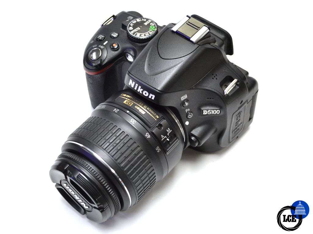 Nikon D5100 + 18-55mm