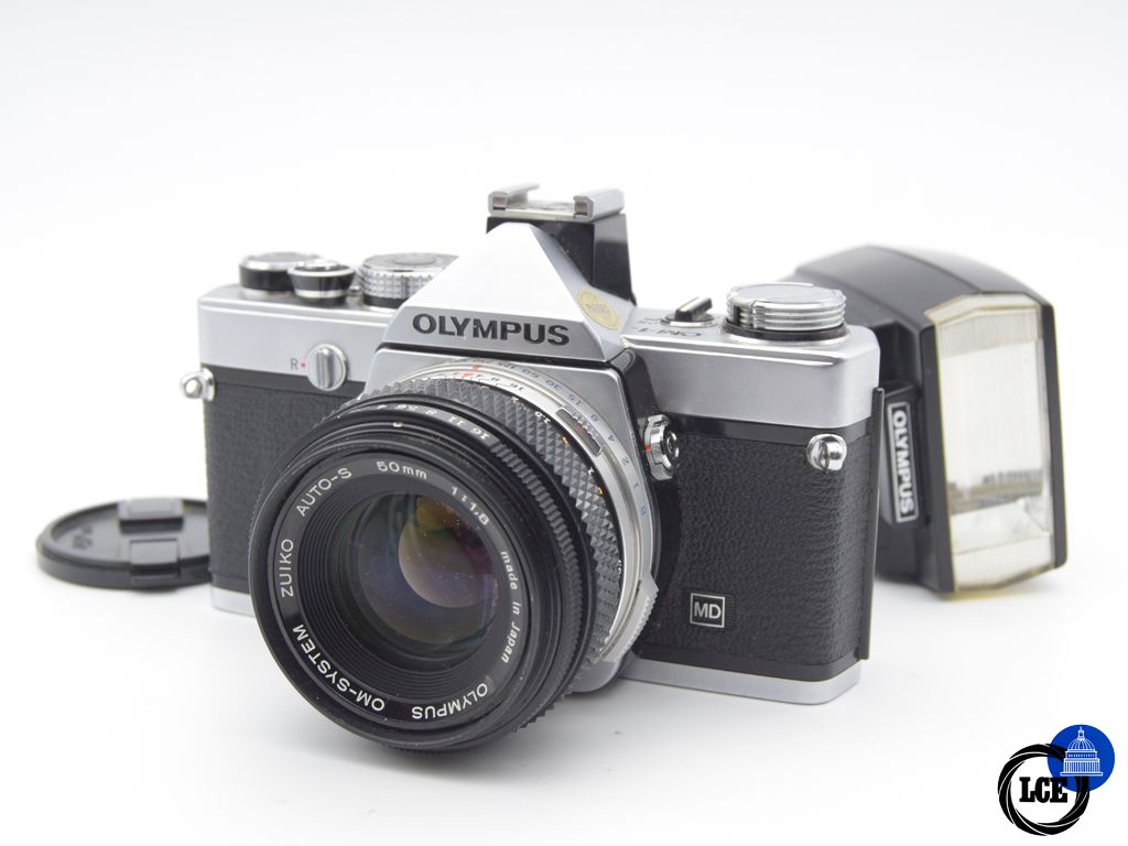 Olympus OM-1 + 50mm f/1.8 + T20 Flash