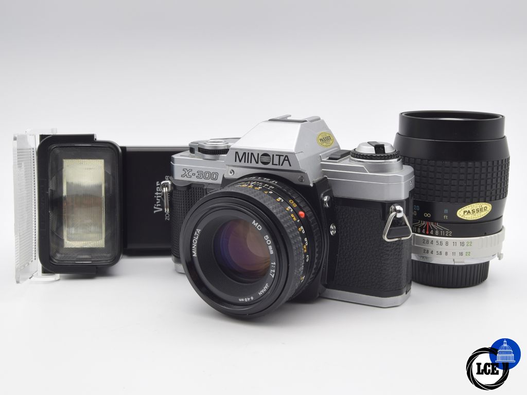 Minolta X-300 + 50mm f/1.7 + 135mm f/2.8 + Vivitar 3500 Flash