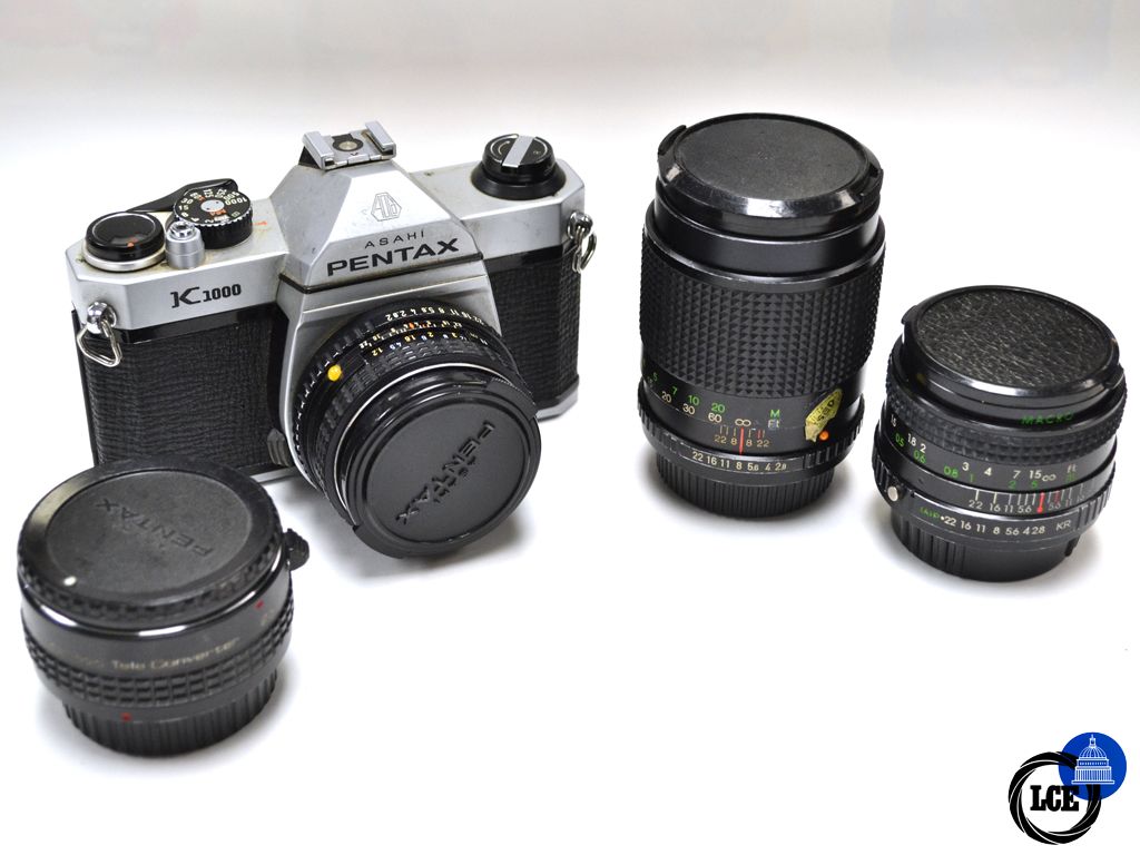 Pentax K1000 + 50mm F2 + 135mm F2.8 + 28mm F2.8