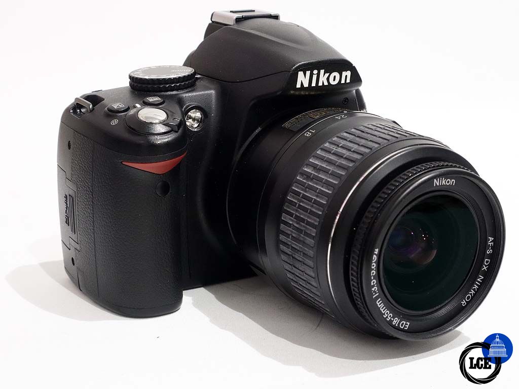 Nikon D3000 + 18-55mm II