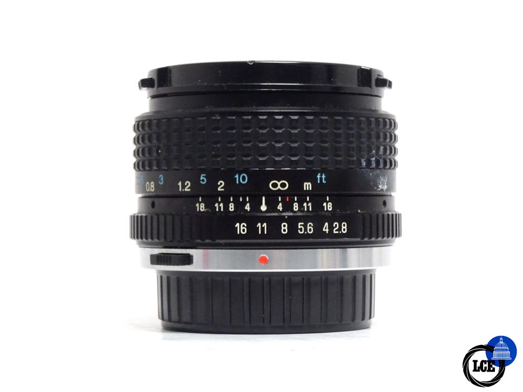 Tokina 28mm f/2.8 RMC lens - Olympus OM Fit