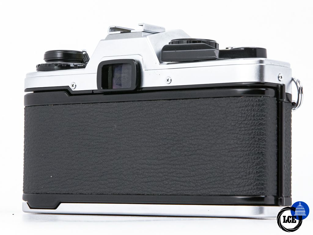 Olympus OM-10 + 50mm f1.8 + Manual Adapter