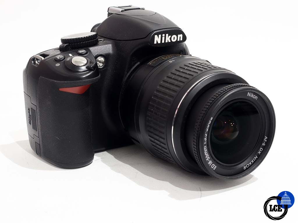 Nikon D3100 + 18-55mm