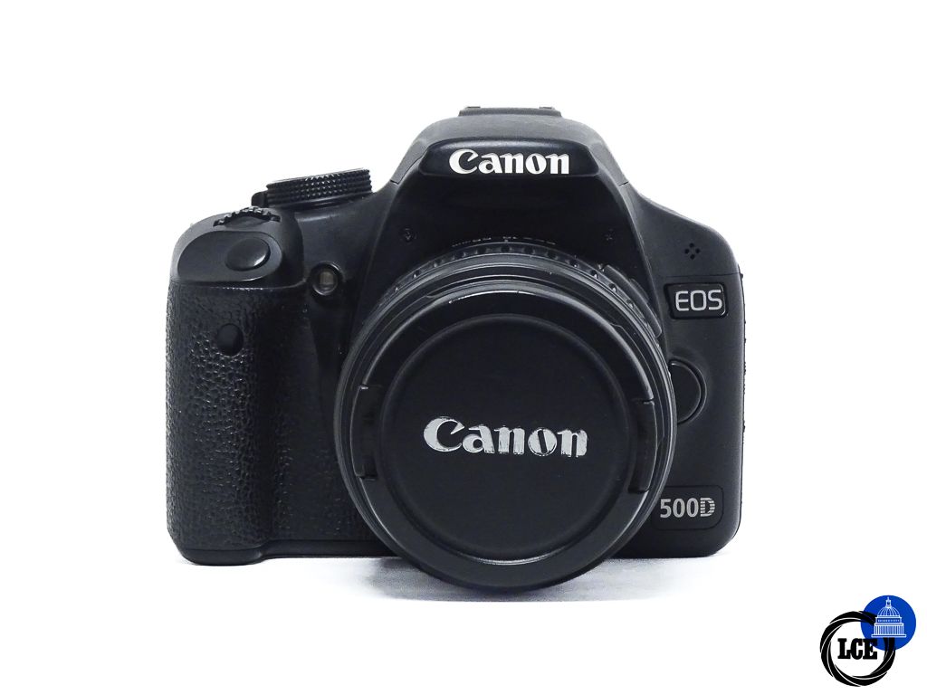 Canon 500D + 18-55mm f/3.5-5.6 II *light moisture*