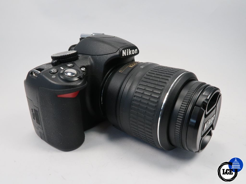 Nikon D3100 + 18-55mm VR shutter count 3147