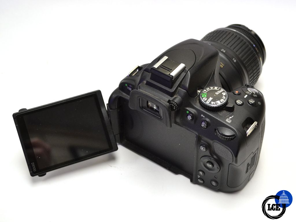 Nikon D5100 + 18-55mm