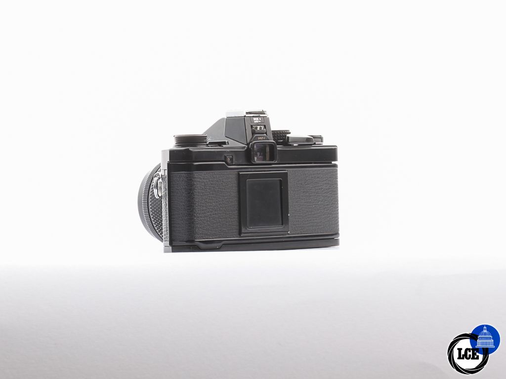 Olympus OM-2 + 50mm f/1.8 [4*] | 10113339