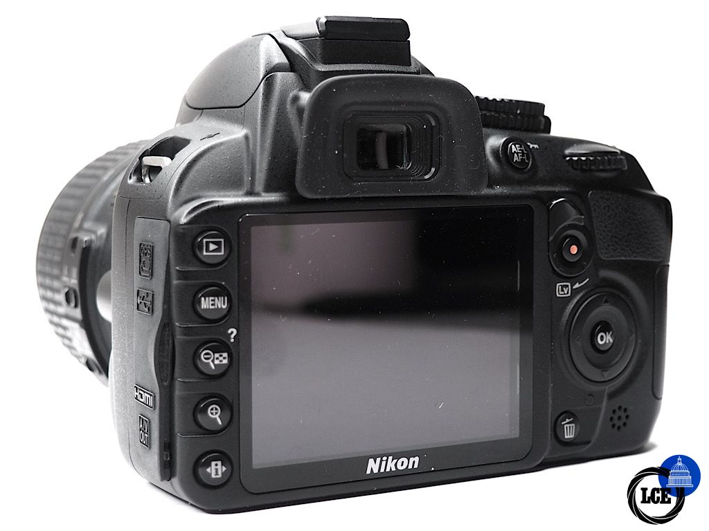 Nikon D3100 + 18-55mm