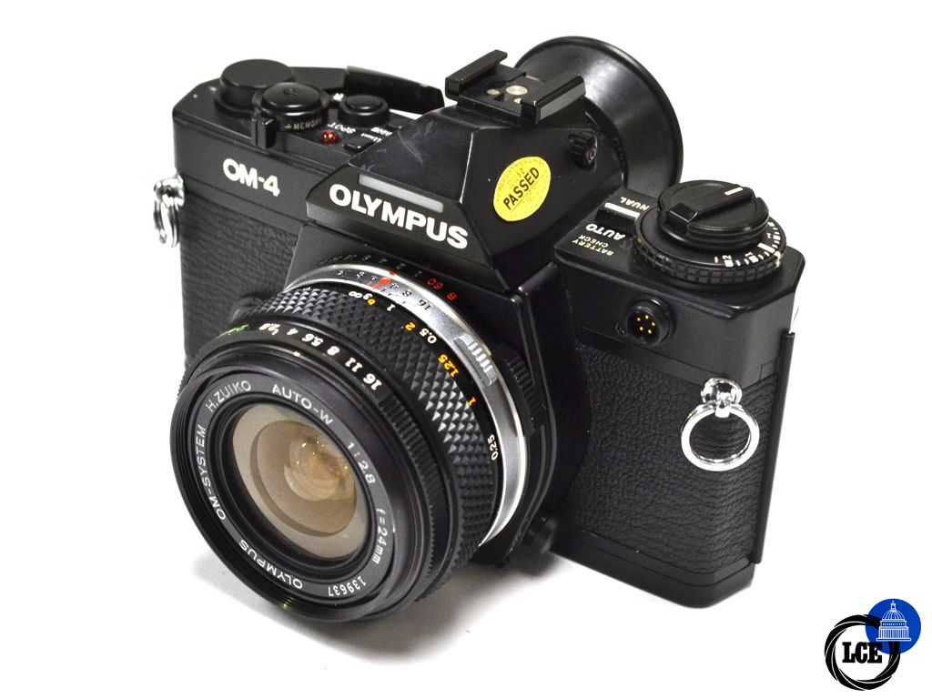 Olympus OM-4 + 24mm f2.8 + 90mm f2.8 + 75-150mm f4 + 75-205mm f3.8