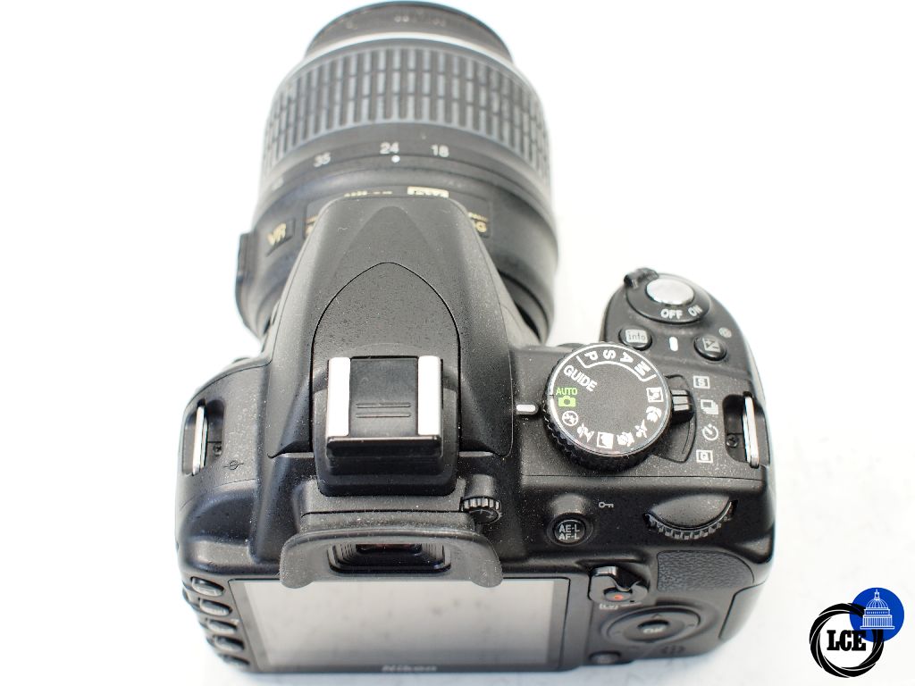 Nikon D3100 with 18-55mm f3.5-5.6G VR  3.5k sc