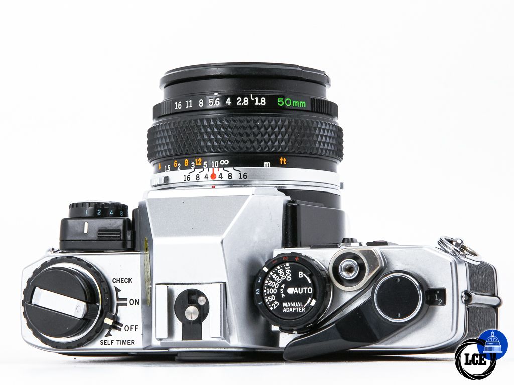 Olympus OM-10 + 50mm f1.8 + Manual Adapter