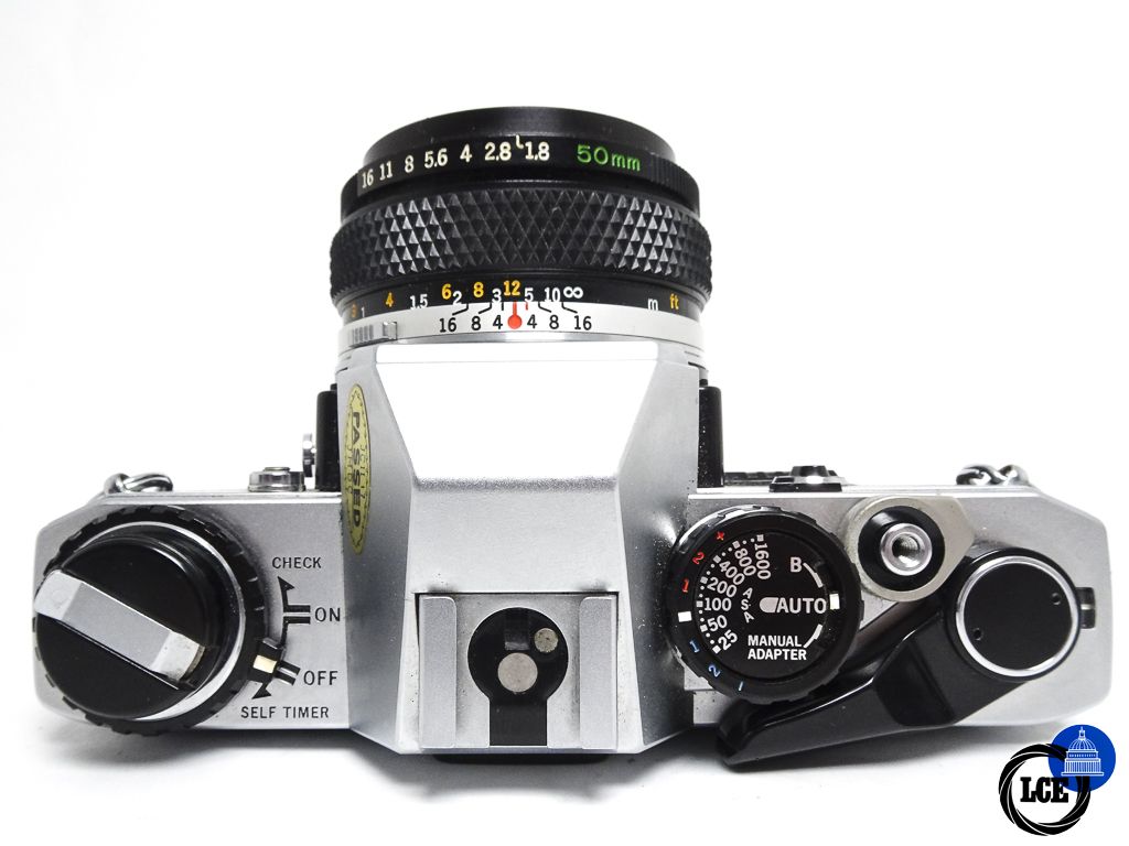 Olympus OM-10 + 50mm f/1.8 ZUIKO MC