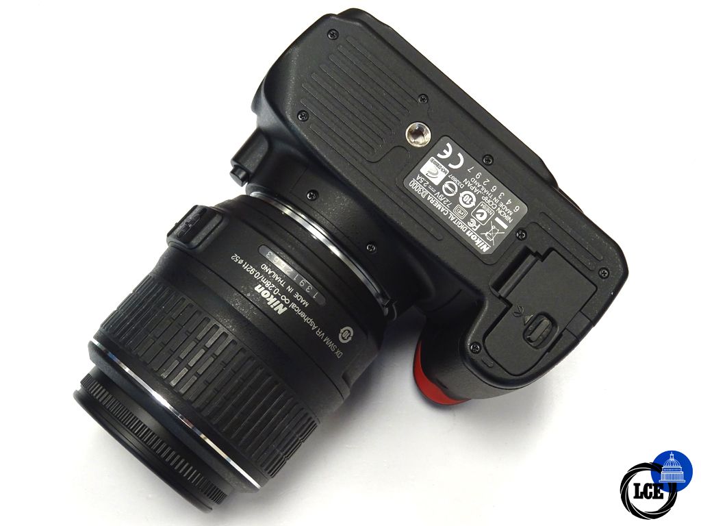 Nikon D3000 + 18-55mm 