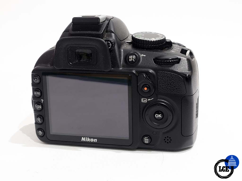 Nikon D3100 + 18-55mm