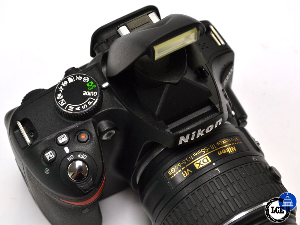 Nikon D3200 + 18-55mm