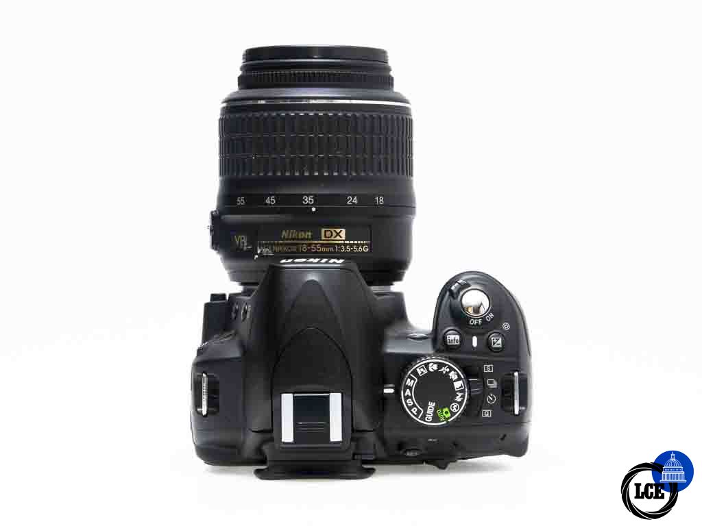 Nikon D3100 +  AF-S 18-55mm VR