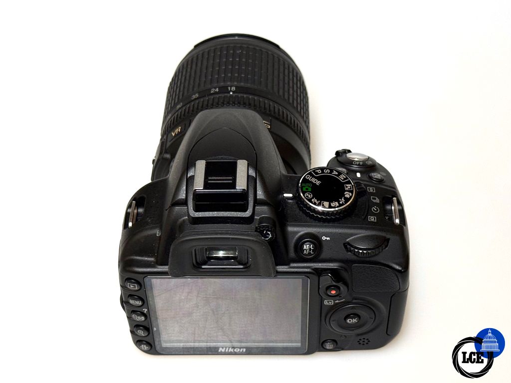 Nikon D3100 + 18-105mm F3.5-5.6 DX VR