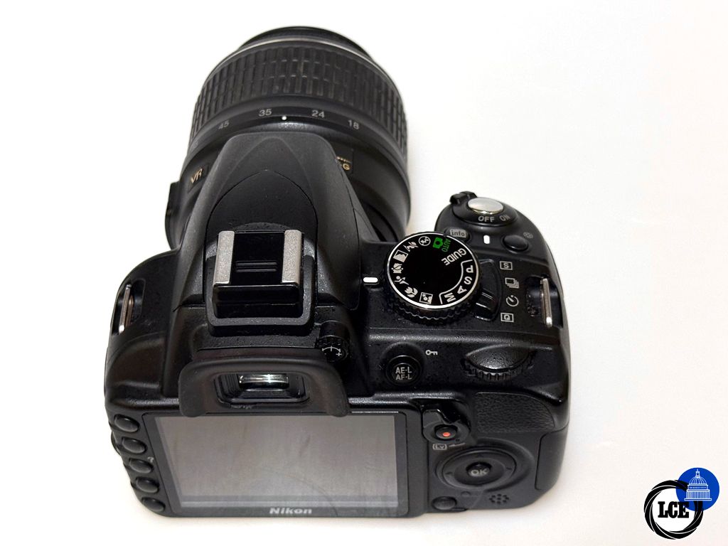 Nikon D3100 + 18-55mm VR