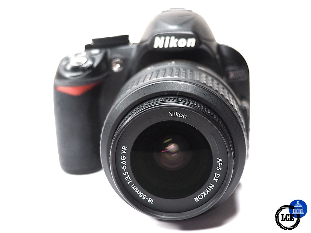 Nikon D3100 + 18-55mm