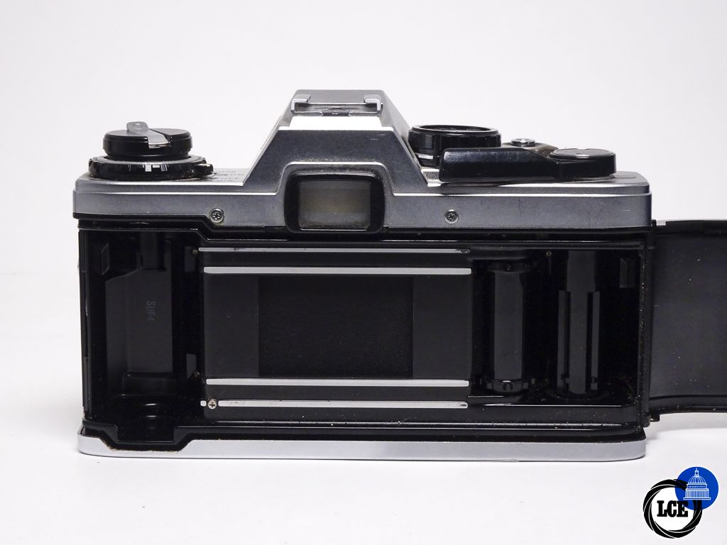 Olympus OM-10 + Manual Adapter + Miranda 28-70mm f3.8-4.8 MC