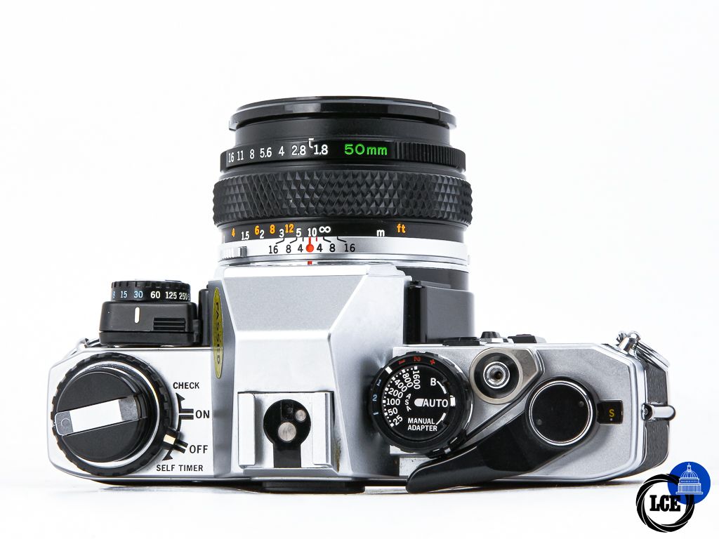 Olympus OM10 + 50mm f1.8 + Manual Adapter