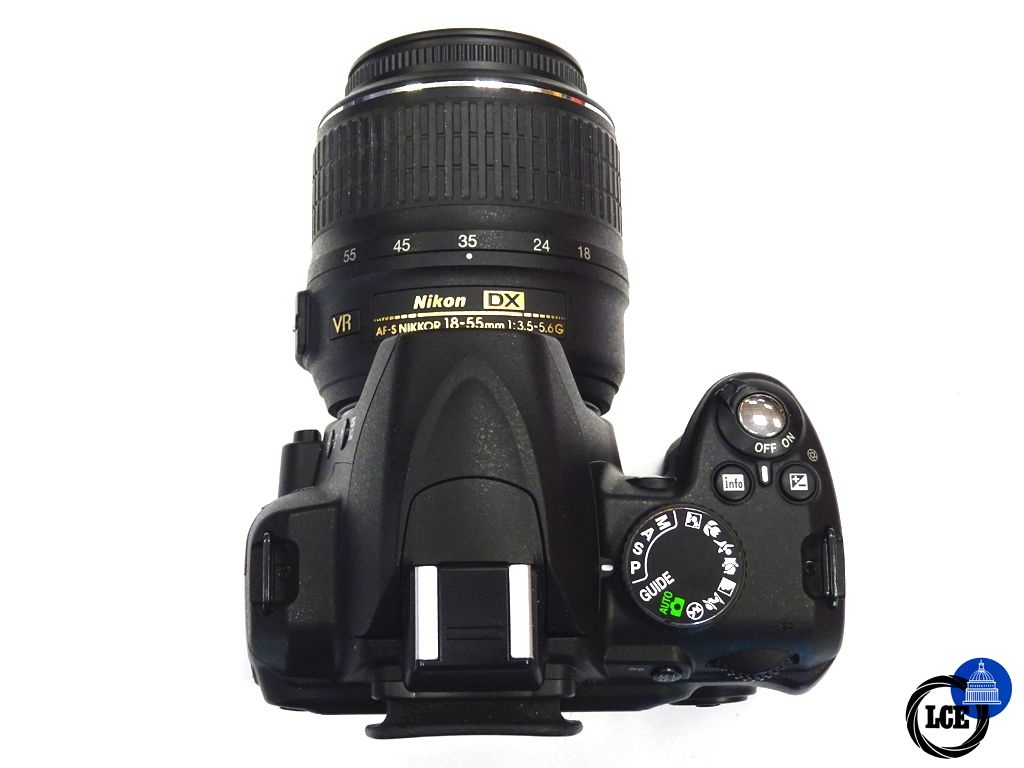 Nikon D3000 + 18-55mm 