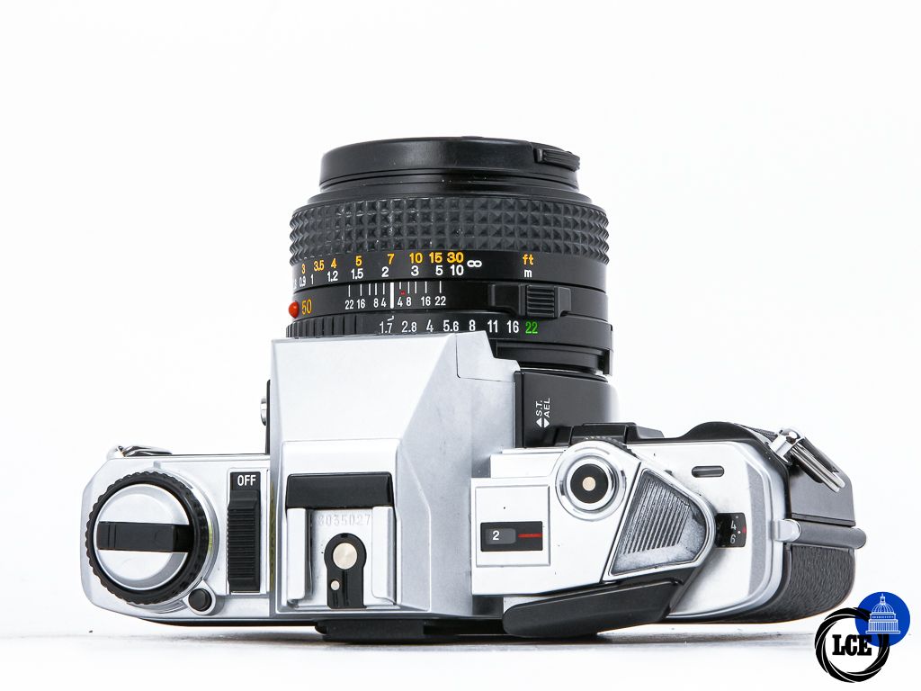 Minolta X-300 + 50mm f1.7 + 70-210mm f4 