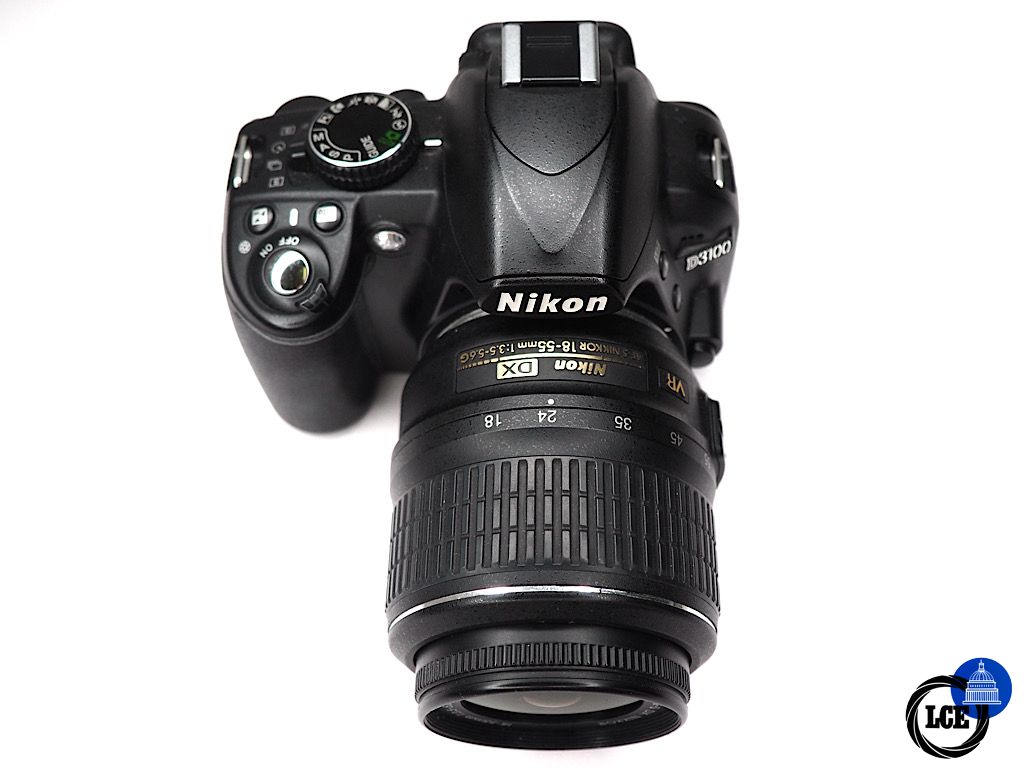 Nikon D3100 + 18-55mm