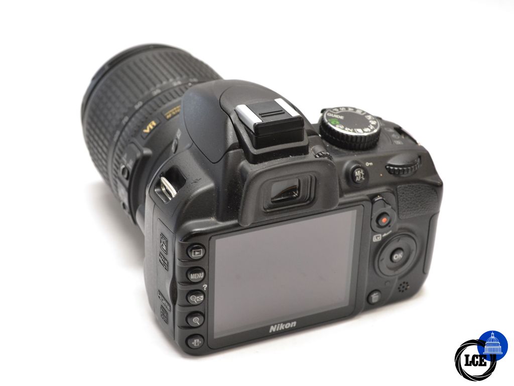 Nikon D3100 + 18-105mm F3.5-5.6 G VR (Low actuations)